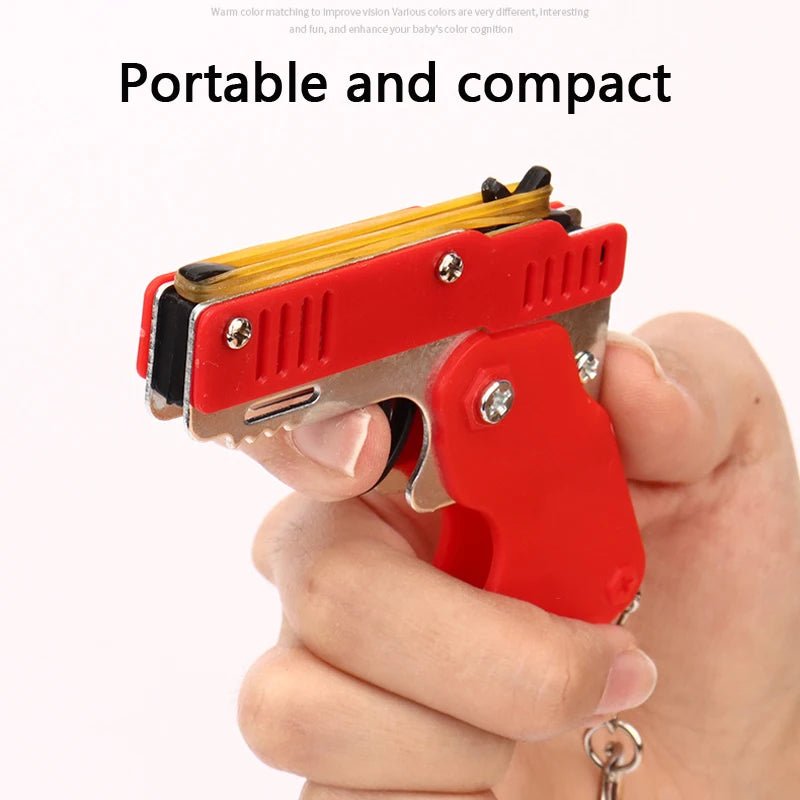 Mini Rubber Band Gun Keychain: Alloy Pistol Toy for Kid's Outdoor Fun